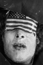 JP Laffont artwork, man with eyes covered by US flag